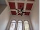 High ceiling featuring three arched windows and an eye-catching coffered design with a modern ceiling fan at 1458 Sweet Bottom Cir, Marietta, GA 30064