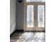 Stunning entryway featuring hardwood floors and a decorative glass door that brightens the space at 1458 Sweet Bottom Cir, Marietta, GA 30064