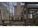 Side view showing back deck, chimney and screened-in porch of the home at 1458 Sweet Bottom Cir, Marietta, GA 30064