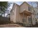 Exterior of a two-story home with a porch and landscape hardscaping at 1458 Sweet Bottom Cir, Marietta, GA 30064