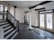 Elegant foyer with grand staircase, striking black trim, and large windows at 1458 Sweet Bottom Cir, Marietta, GA 30064