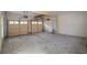 Spacious two-car garage with overhead doors and concrete flooring offers ample parking and storage space at 1458 Sweet Bottom Cir, Marietta, GA 30064