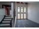 Bright and spacious living room featuring a striking staircase and oversized windows at 1458 Sweet Bottom Cir, Marietta, GA 30064