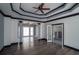 Stunning living room with hardwood floors and dark trim is adjacent to a spa-like bathroom at 1458 Sweet Bottom Cir, Marietta, GA 30064
