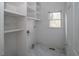 Pantry with white shelving and a window at 1458 Sweet Bottom Cir, Marietta, GA 30064