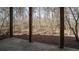Covered patio with view of wooded backyard at 1458 Sweet Bottom Cir, Marietta, GA 30064