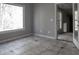 Room with tiled floors and numerous windows at 1458 Sweet Bottom Cir, Marietta, GA 30064