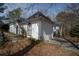 Side exterior of a home with mature trees surrounding the home at 1458 Sweet Bottom Cir, Marietta, GA 30064