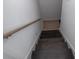 View of dark wood stairs with a wooden handrail at 1458 Sweet Bottom Cir, Marietta, GA 30064