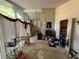 Bright living room with brick wall and pendant lighting at 2323 Valleyside Dr, Decatur, GA 30032