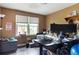Cozy home office with dual monitors, a window cat perch, and natural light at 378 Cole Sw Dr, Lilburn, GA 30047