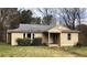 Modest single-story home featuring a cozy front porch and a traditional architectural style at 339 Kelly Mill Rd, Cumming, GA 30040