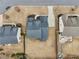 Aerial view of a house with a well-maintained lawn, showcasing the roof and surrounding landscape at 504 Taymack Farm Ct, Woodstock, GA 30188