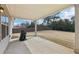 Covered back patio overlooks a large backyard with a privacy fence at 504 Taymack Farm Ct, Woodstock, GA 30188