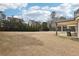 Large backyard perfect for outdoor activities and entertainment at 504 Taymack Farm Ct, Woodstock, GA 30188