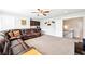 Bonus room with a large sectional sofa and snack bar, perfect for Gathering movie night at 504 Taymack Farm Ct, Woodstock, GA 30188