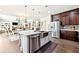 Modern kitchen with stainless steel appliances, granite countertops, and an island at 504 Taymack Farm Ct, Woodstock, GA 30188