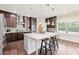Spacious kitchen with granite counters, large island, and stainless steel appliances at 504 Taymack Farm Ct, Woodstock, GA 30188