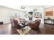 Cozy living room with fireplace, built-in shelves, and comfortable seating, perfect for relaxation and entertainment at 504 Taymack Farm Ct, Woodstock, GA 30188