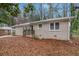 Attractive one-story brick house showcasing a welcoming entrance and well-kept landscaping at 1883 Windsor Sw Dr, Atlanta, GA 30311