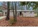 Beautiful one-story brick home featuring a cozy covered carport and a quaint front yard at 1883 Windsor Sw Dr, Atlanta, GA 30311