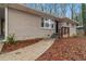 Charming one-story brick home with a walkway leading to the front door and a well-maintained yard at 1883 Windsor Sw Dr, Atlanta, GA 30311