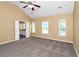 Bright main bedroom with vaulted ceiling, ceiling fan, and adjoining bath at 4678 Ravenwood Loop, Union City, GA 30291