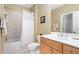 Bathroom with tile surround tub and shower, and updated sink at 1967 Mason Mill Rd, Decatur, GA 30033