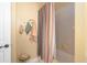 Neutral bathroom showcasing a tiled shower with a cheerful yellow duck at 1967 Mason Mill Rd, Decatur, GA 30033