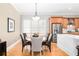 Dining area with hardwood floors, stainless steel appliances, and granite countertops at 1967 Mason Mill Rd, Decatur, GA 30033