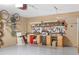 Well-lit garage featuring ample workspace, storage, and wall-mounted tool organizers for a handyman's dream at 1967 Mason Mill Rd, Decatur, GA 30033