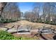 Neighborhood park featuring open space with benches, mature trees and green space for the neighborhood at 1967 Mason Mill Rd, Decatur, GA 30033