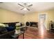 Cozy living room featuring hardwood floors, a fireplace, and neutral walls at 4 Quail Run, Decatur, GA 30035