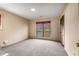 Bedroom with neutral walls and gray carpeting at 4614 Winthrop Dr, Atlanta, GA 30337