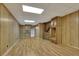 Spacious finished basement with wood paneling, laminate floors and built in cabinets at 567 Shiloh Nw Rd, Kennesaw, GA 30144