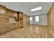Finished basement features built-in wooden cabinets and a large open area for entertaining at 567 Shiloh Nw Rd, Kennesaw, GA 30144