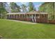 Charming single-story brick home featuring a well-manicured lawn and inviting front porch at 567 Shiloh Nw Rd, Kennesaw, GA 30144