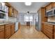 Well-designed kitchen featuring granite countertops, modern appliances, and an adjacent eat-in area at 567 Shiloh Nw Rd, Kennesaw, GA 30144