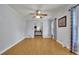 Bright living room featuring pristine wood floors and stylish decorative curtains at 567 Shiloh Nw Rd, Kennesaw, GA 30144