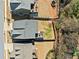 Birds-eye view of the backyard with wooden deck and outdoor entertaining space, offering privacy at 1599 Benham Dr, Snellville, GA 30078
