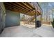 Spacious under deck with a grill and concrete patio at 1599 Benham Dr, Snellville, GA 30078