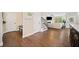 Inviting entryway features hardwood floors, a coat closet and staircase leading to the upper level at 1599 Benham Dr, Snellville, GA 30078