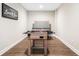 Finished basement with foosball, ping pong, and durable laminate floors at 1599 Benham Dr, Snellville, GA 30078