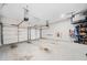 Spacious three-car garage with ample storage space and room for a workshop at 1599 Benham Dr, Snellville, GA 30078