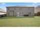 Well-maintained lawn and privacy fence at 7686 Brazos Trl, Fairburn, GA 30213