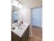 Stylish bathroom featuring a vanity with a sink, a well-lit mirror, and a clean, modern design at 171 Echols Bnd, Hiram, GA 30141