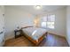Cozy bedroom with natural light, a comfortable bed, and simple decor for a restful retreat at 171 Echols Bnd, Hiram, GA 30141