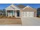 Charming home featuring brick and siding exterior, well-maintained landscaping, and a two-car garage at 171 Echols Bnd, Hiram, GA 30141