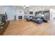 Expansive living area with wood floors, fireplace, modern kitchen, and ample natural light at 171 Echols Bnd, Hiram, GA 30141