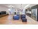 Open-concept living space with modern finishes, fireplace, and seamless flow to the kitchen at 171 Echols Bnd, Hiram, GA 30141